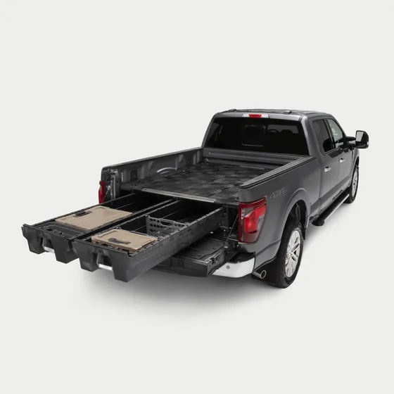 Truck bed storage drawers extended from a pickup