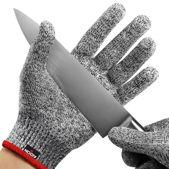 NoCry Level 5 cut resistant glove demonstrated against a knife blade